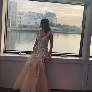 Worn one time like new. It’s in perfect condition with no damaging.